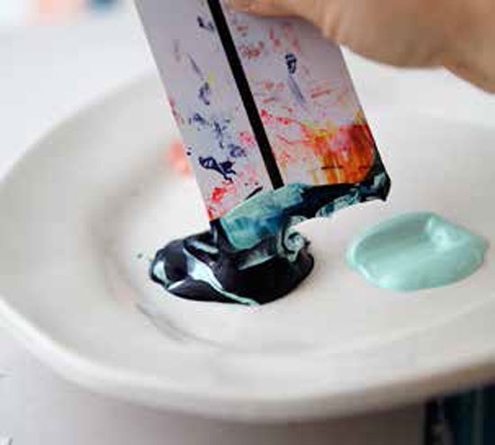 Play with the color saturation by varying the amount of paint and pressure you impose when you drag the card.